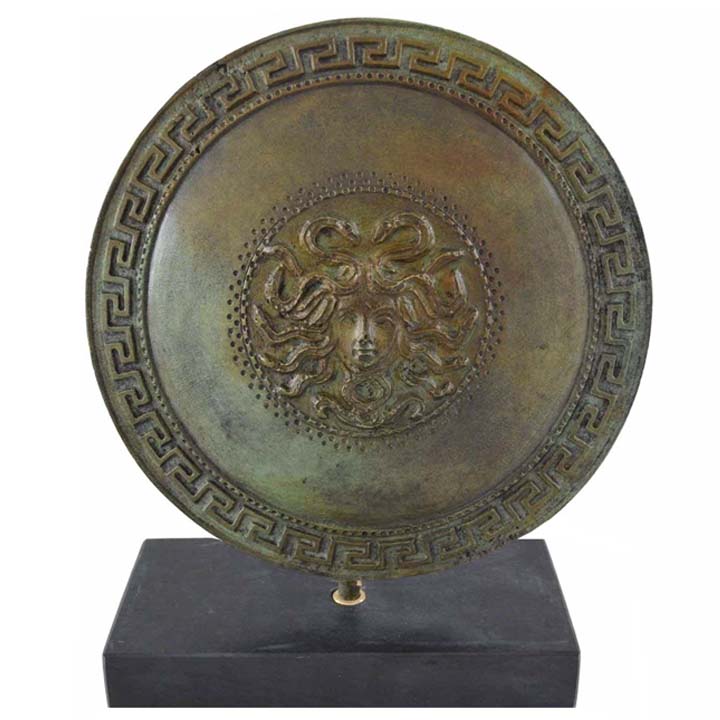 Ancient Greek small bronze shield with Gorgon Medusa head and meander design